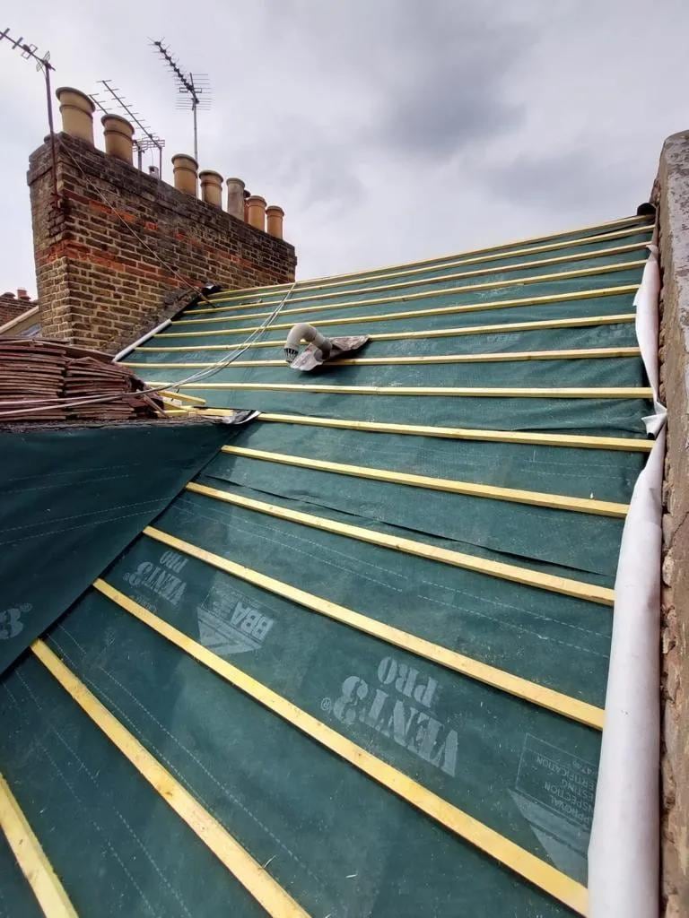 Roof stripped back to breathable membrane and new battens