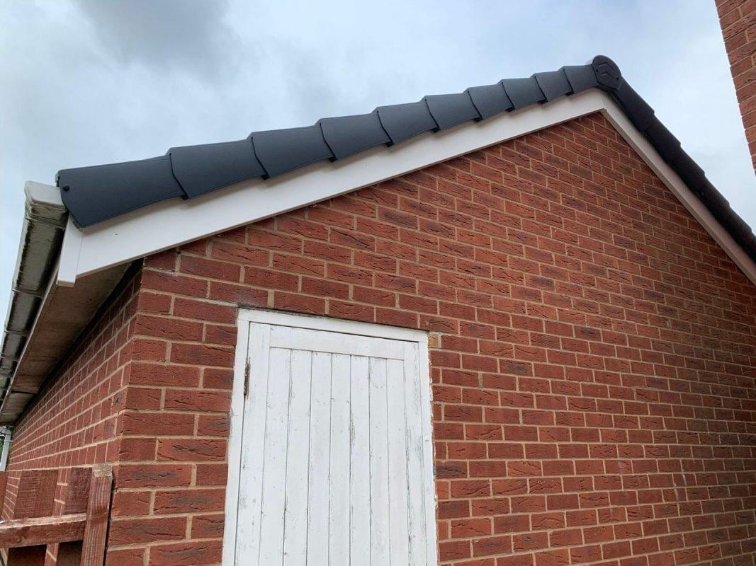 New dry verge fitted to the gable of a brick outbuilding